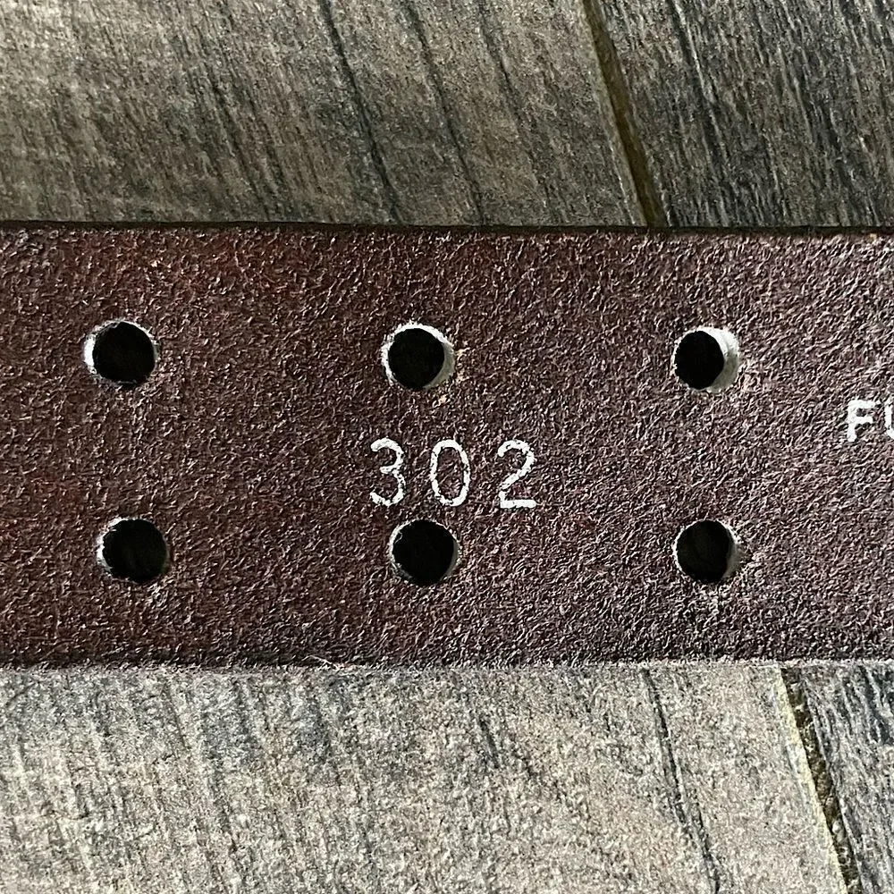 Brown Leather Belt with silver Buckle. 37 inches.